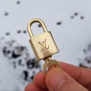 AUTHENTIC VINTAGE LOUIS VUITTON LOCK PENDANTS